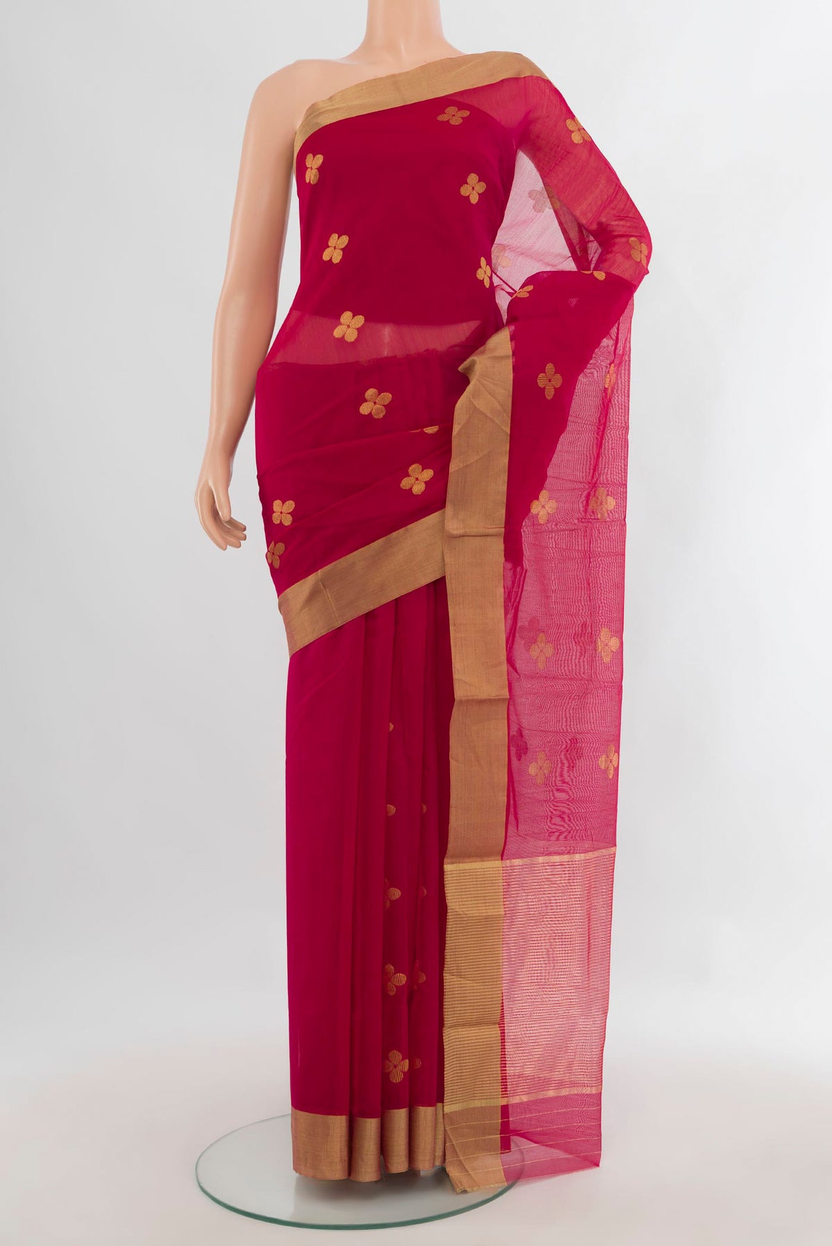 Dark Pink Chanderi Cotton Saree with Zari Butta on the body and Zari Border.  displayed on a mannequin