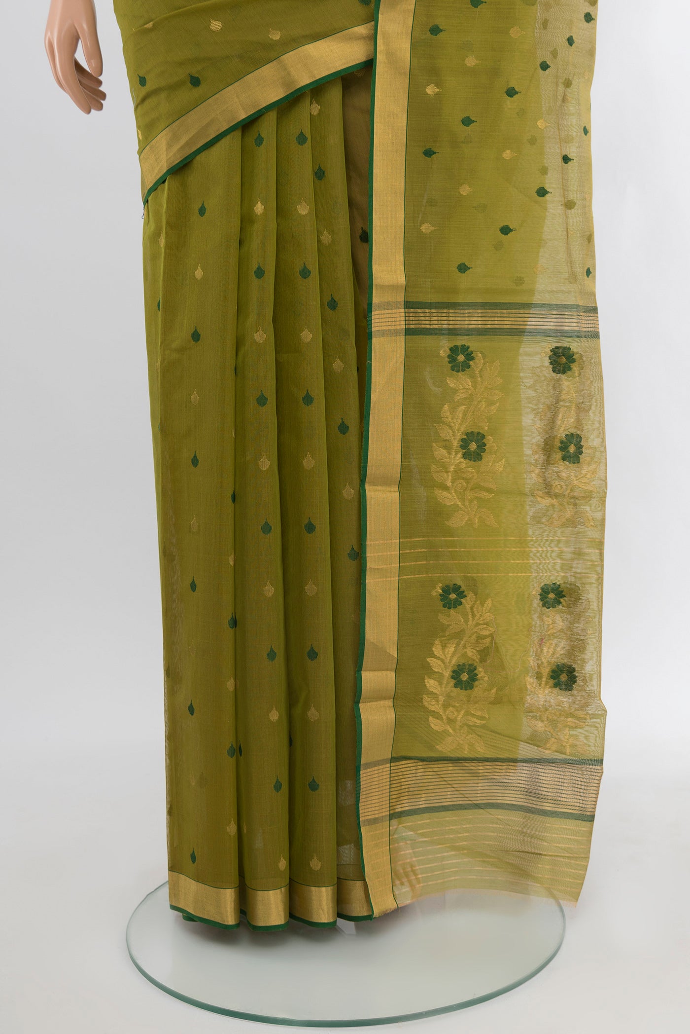 Pleats and pallu of Green Chanderi Silk Cotton Saree with Zari And Thread Butta on the body and Zari Border. 