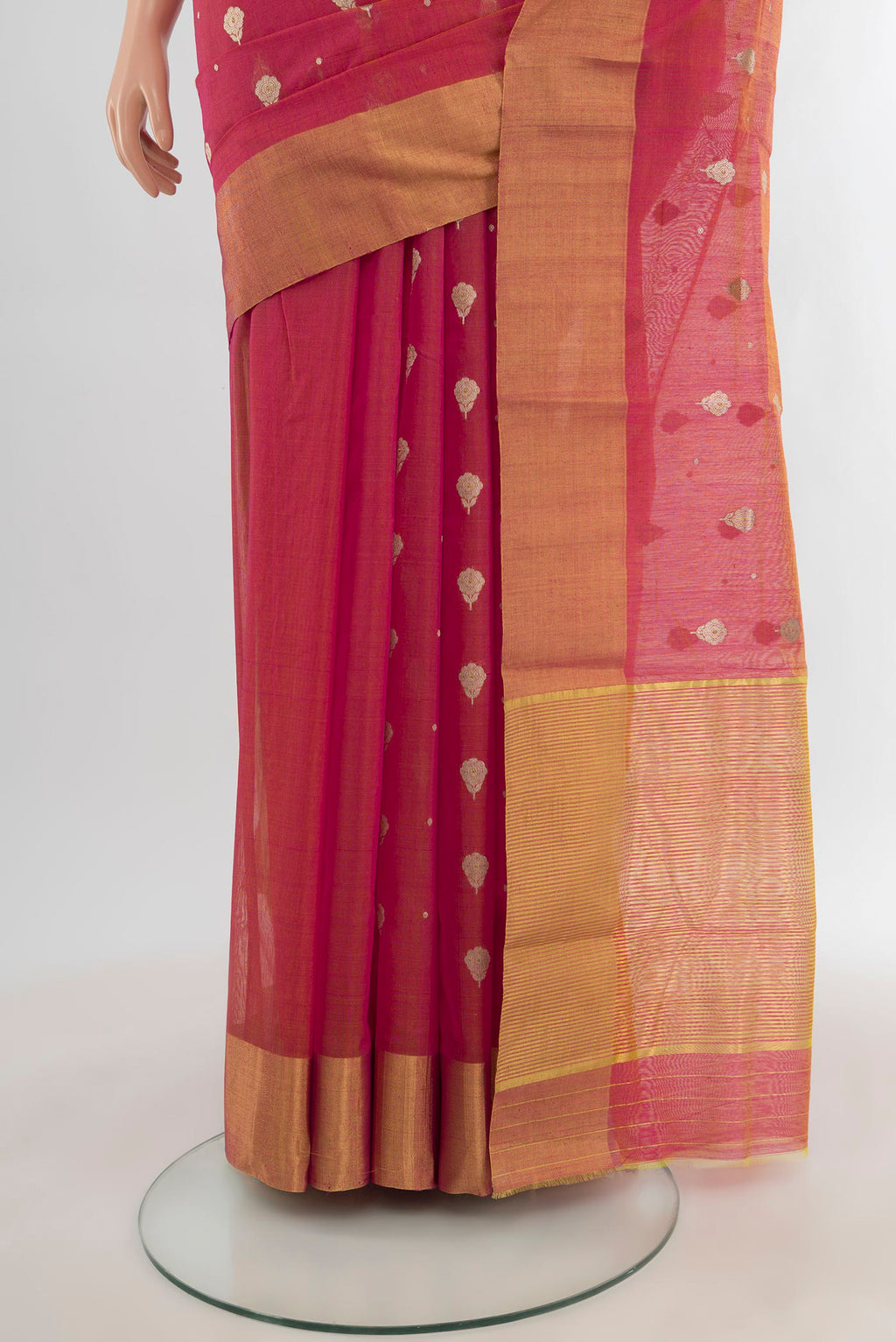 Pleats and pallu of Coral Chanderi Silk Cotton Saree with Zari Butta on the body and Zari Border. 