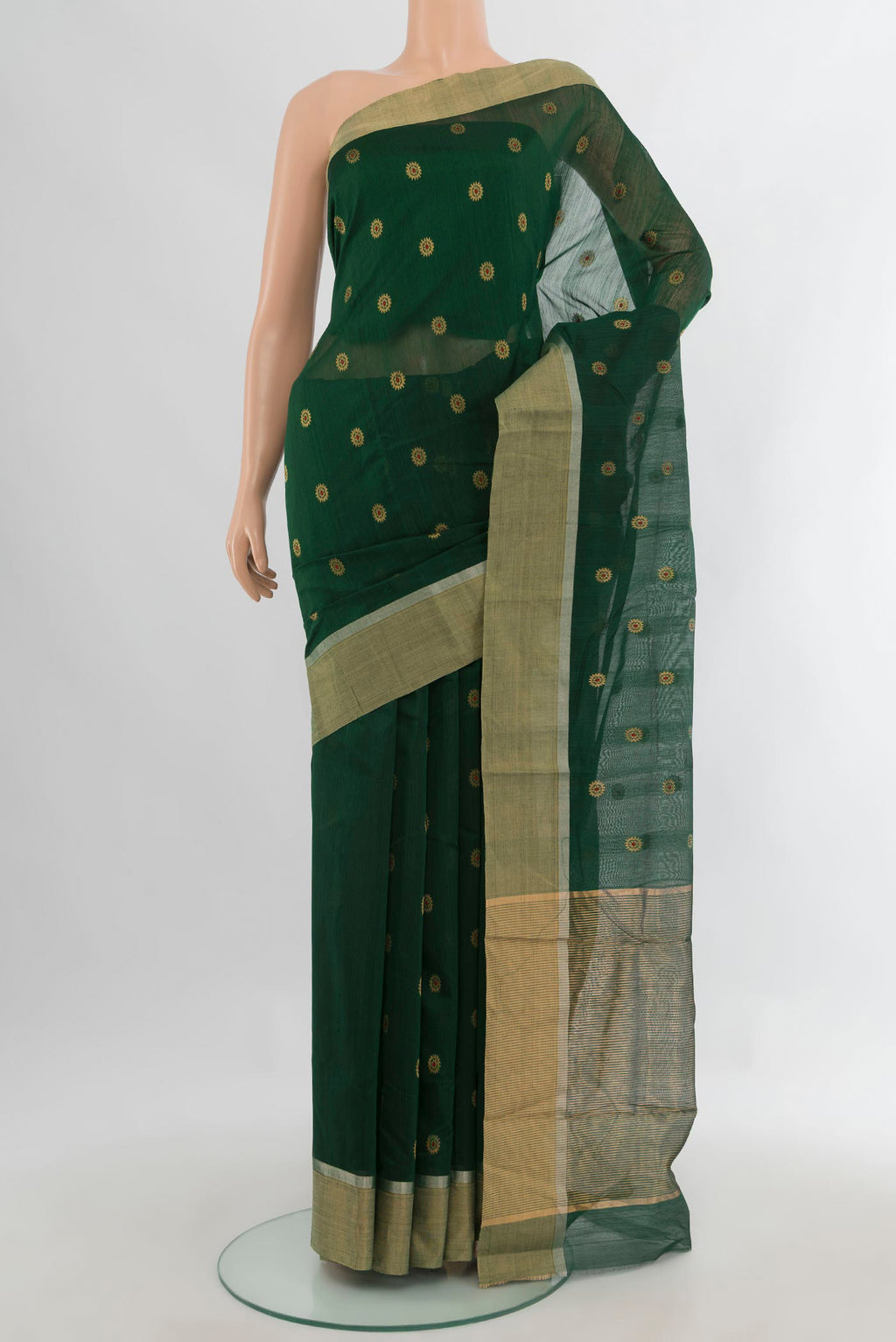 Bottle Green Chanderi Cotton Saree with Zari Butta on the body and Zari Border.  displayed on a mannequin
