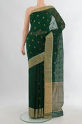 Bottle Green Chanderi Cotton Saree with Zari Butta on the body and Zari Border.  displayed on a mannequin