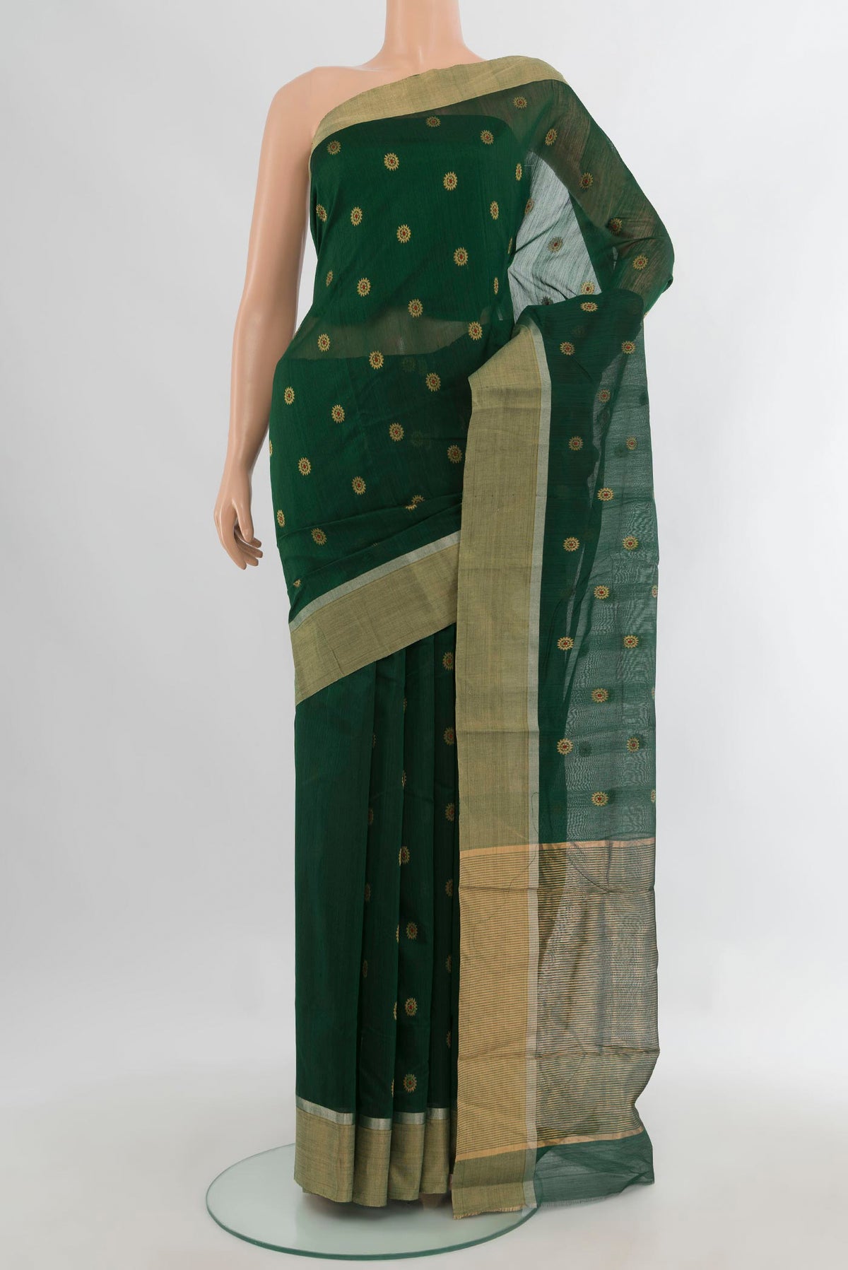 Bottle Green Chanderi Cotton Saree with Zari Butta on the body and Zari Border.  displayed on a mannequin
