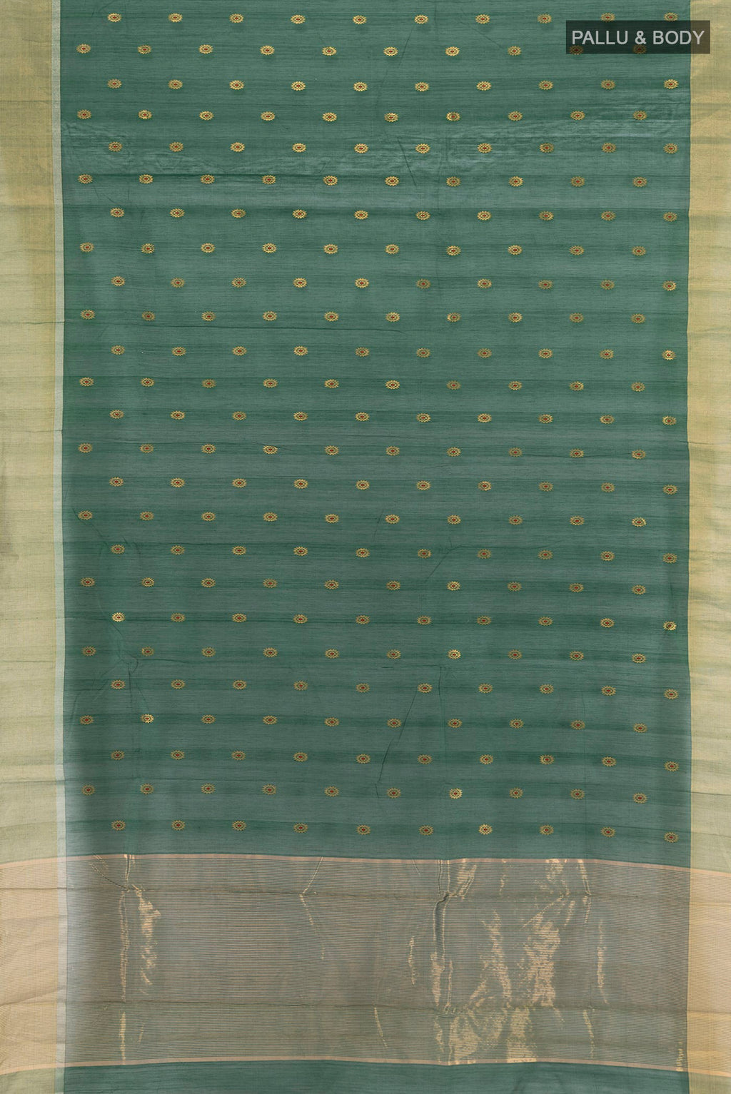 Flat view of Bottle Green Chanderi Cotton Saree with Zari Butta on the body and Zari Border. 