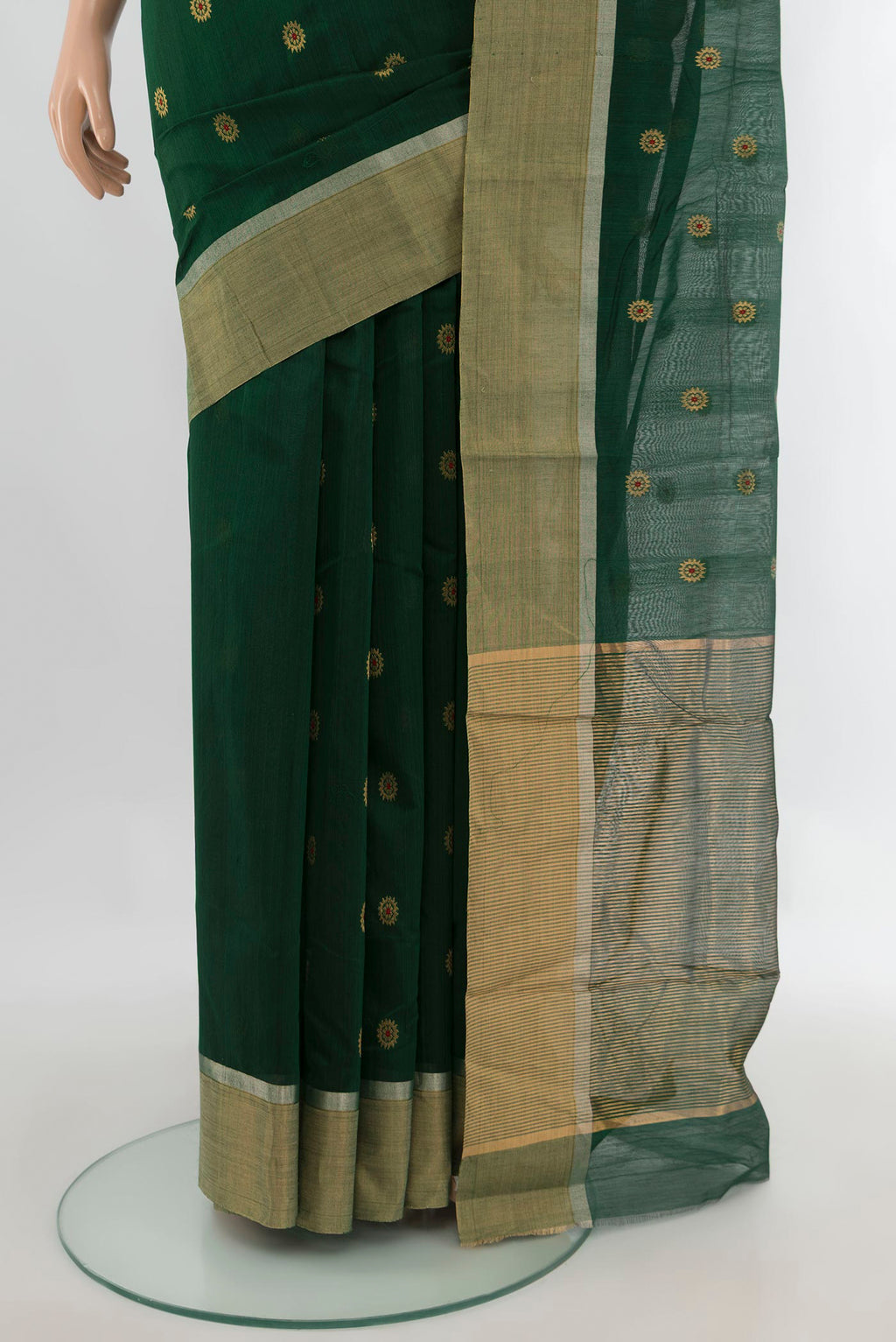 Pleats and pallu of Bottle Green Chanderi Cotton Saree with Zari Butta on the body and Zari Border. 
