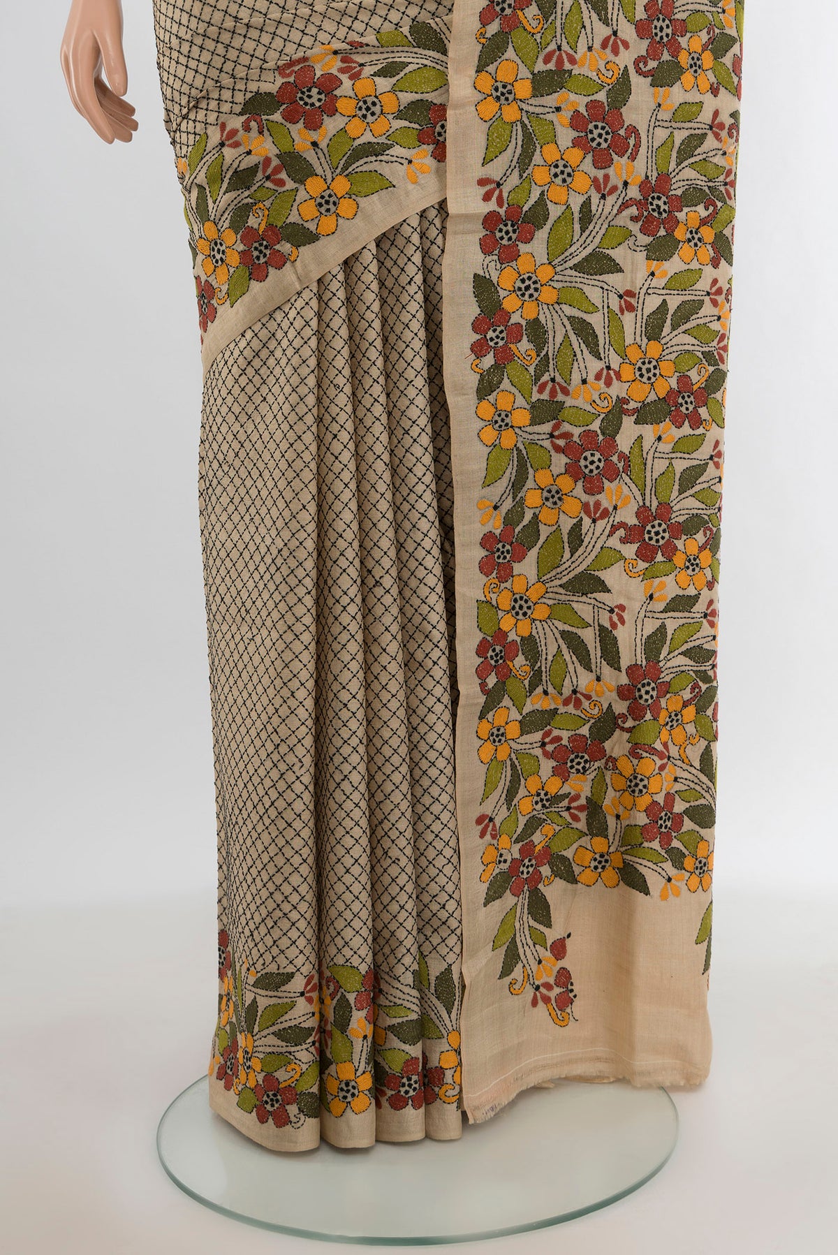 Pleats and pallu of Beige Tussar Silk Saree with Embroidery on the body and Embroidery Border. 
