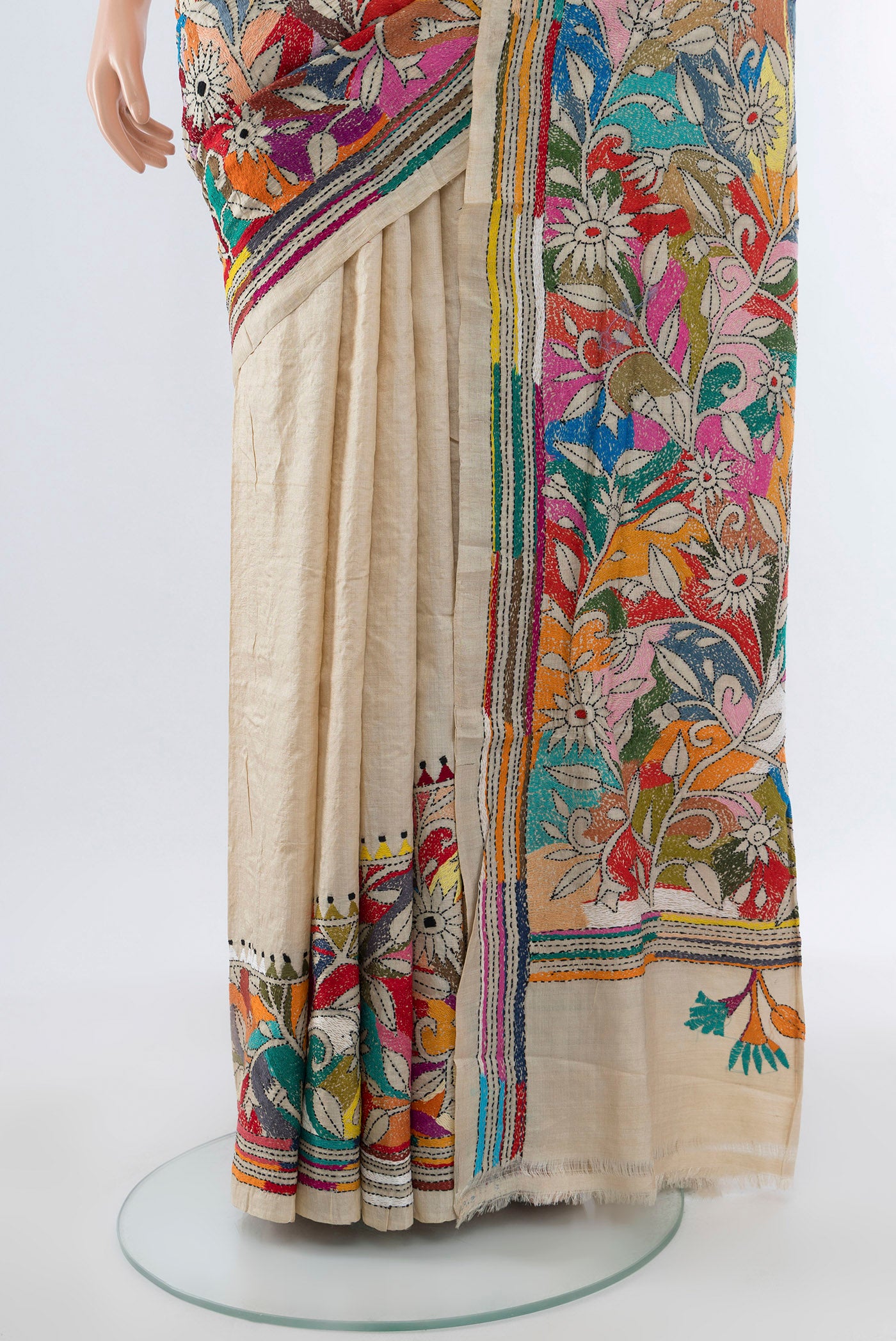Pleats and pallu of Cream Kantha Silk Saree with Jacquard With Thread Butta on the body and Silk Border. 
