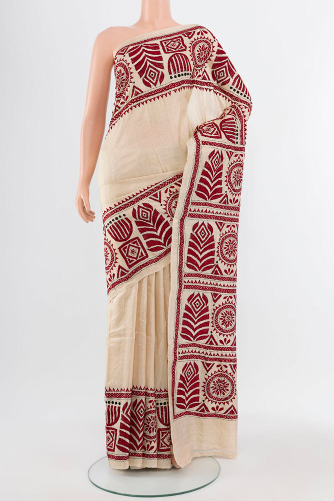 Cream Kantha Silk Saree with Jacquard With Thread Butta on the body and Silk Border.  displayed on a mannequin
