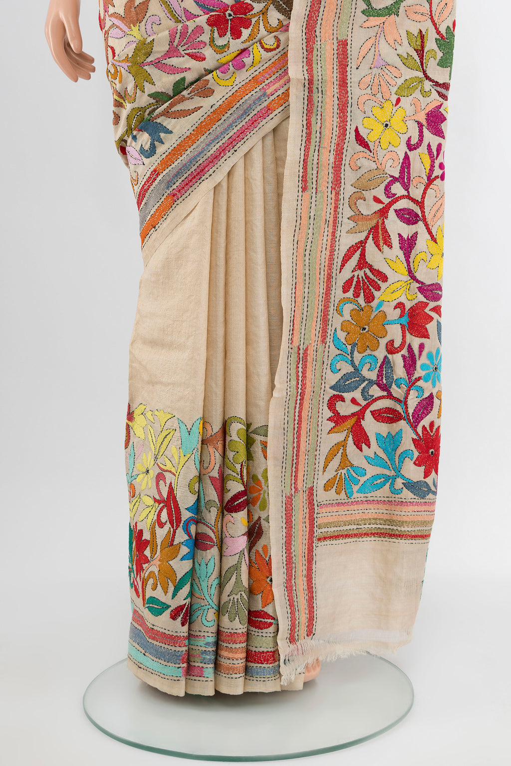 Pleats and pallu of Cream Kantha Silk Saree with Jacquard With Thread Butta on the body and Silk Border. 