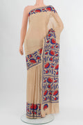 Beige Tussar Silk Saree with Plain Body and Embroidery Border.  displayed on a mannequin