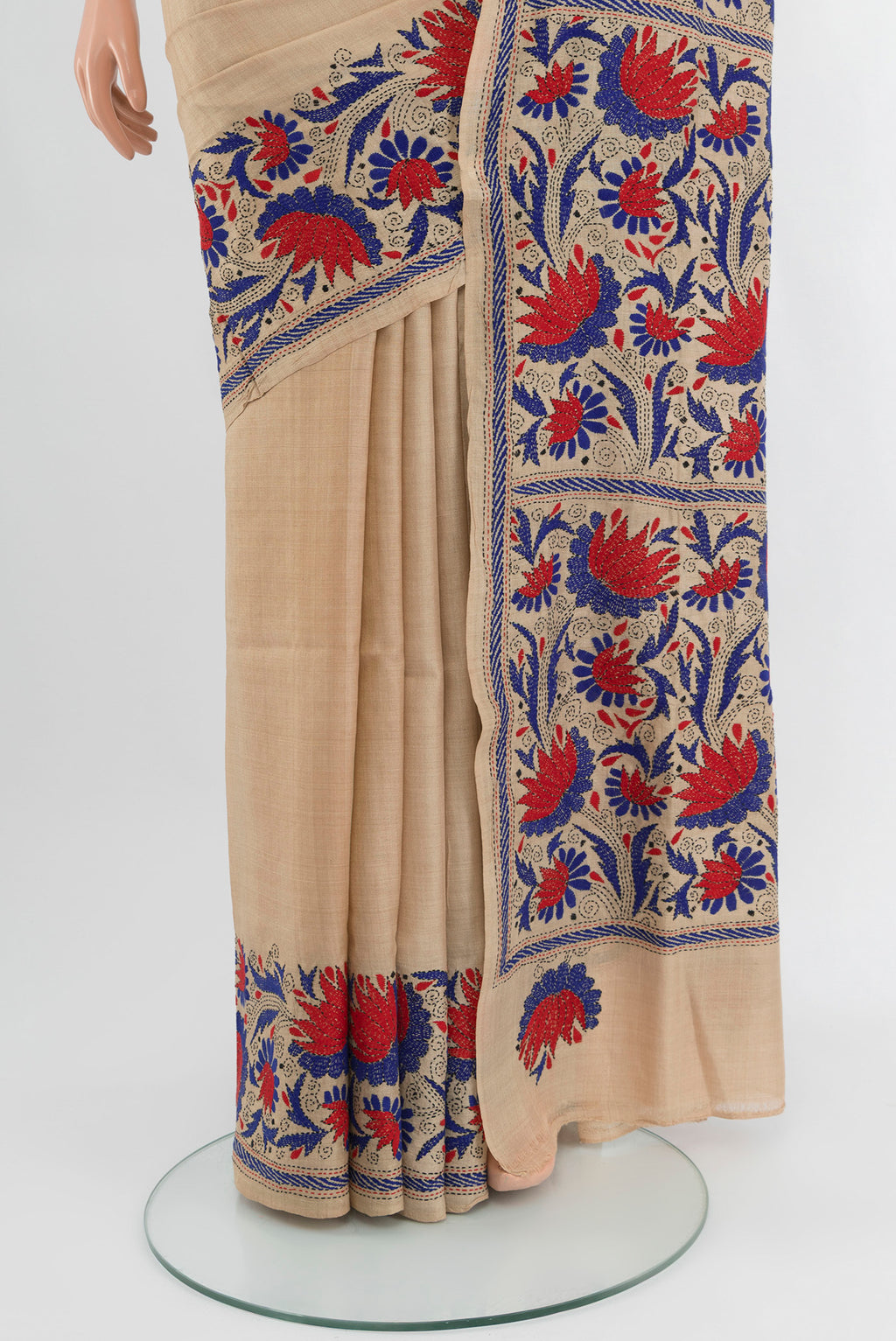 Pleats and pallu of Beige Tussar Silk Saree with Plain Body and Embroidery Border. 