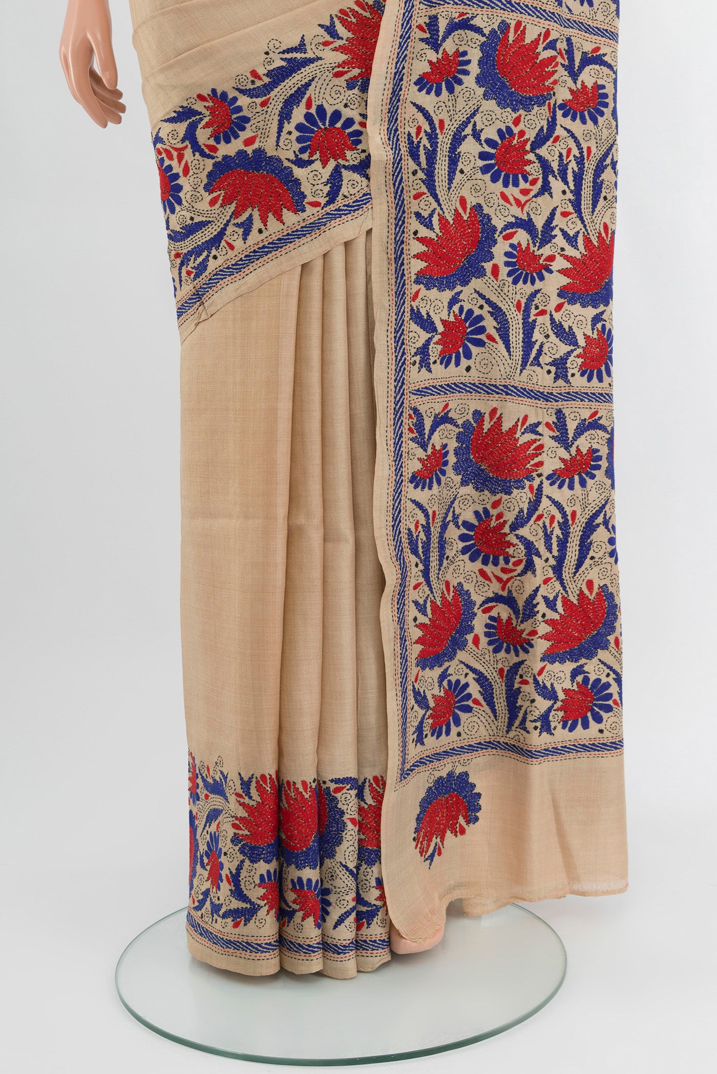 Pleats and pallu of Beige Tussar Silk Saree with Plain Body and Embroidery Border. 