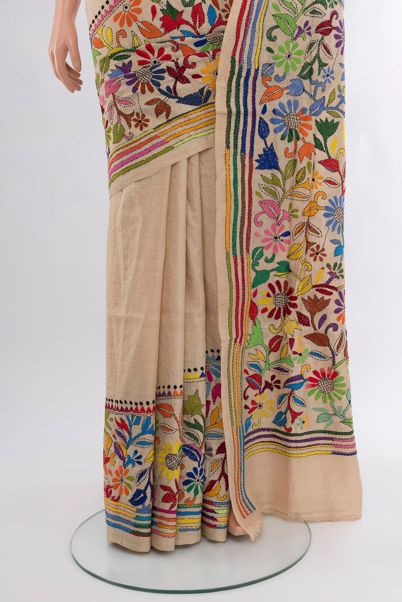 Pleats and pallu of Beige Tussar Silk Saree with Embroidery on the body and Embroidery Border. 