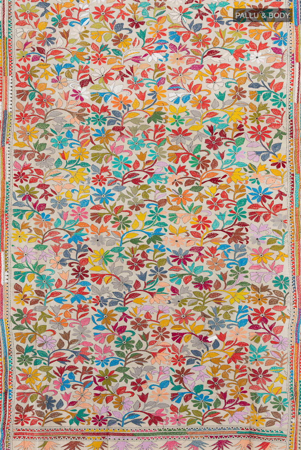 Flat view of Cream Tussar Silk Saree with Kantha Work on the body and Embroidery Border. 