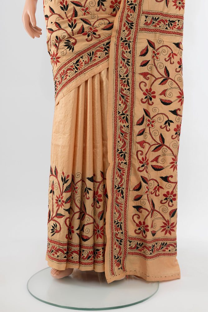 Pleats and pallu of Dark Beige Kantha Silk Saree with Jacquard With Thread Butta on the body and Silk Border. 