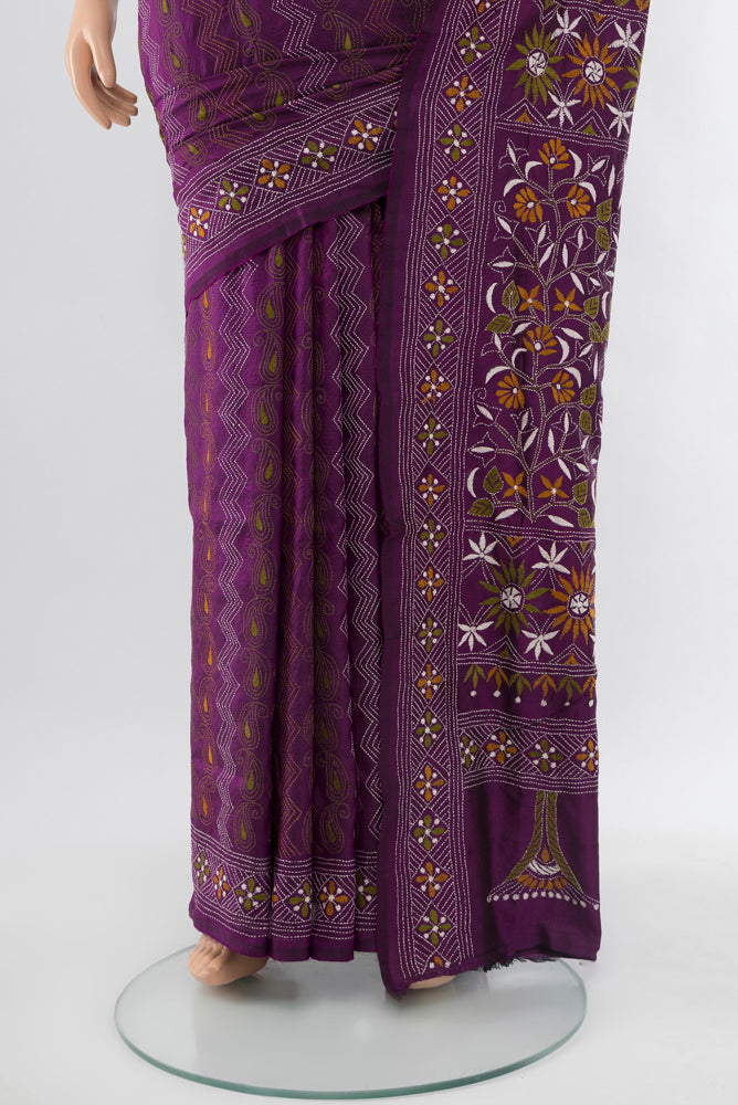 Pleats and pallu of Violet Kantha Silk Saree with Jacquard With Thread Butta on the body and Silk Border. 