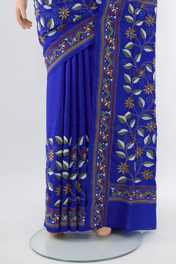 Pleats and pallu of Dark Blue Kantha Silk Saree with Jacquard With Thread Butta on the body and Silk Border. 