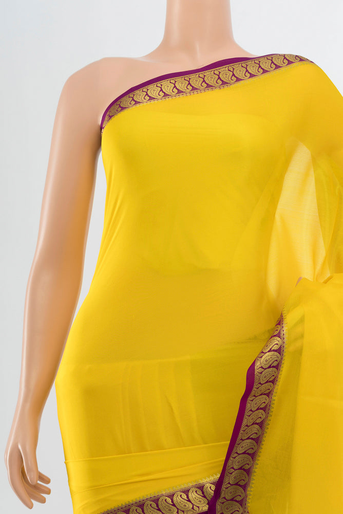 Border image of Lemon Yellow Mysore Crepe Saree with Plain Body and Silk Border. 