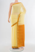 Lemon Yellow Mysore Crepe Saree with Plain Body and Silk Border.  displayed on a mannequin