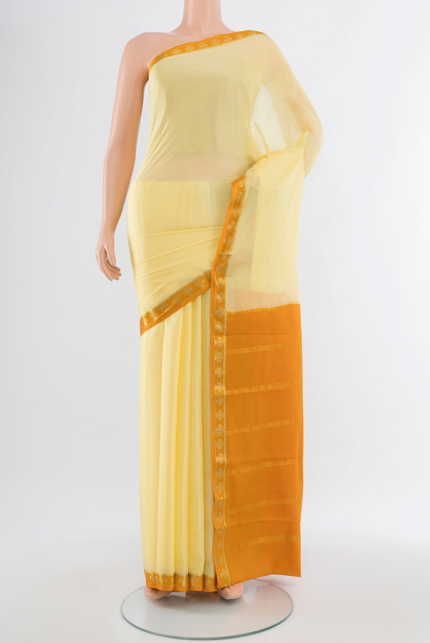 Lemon Yellow Mysore Crepe Saree with Plain Body and Silk Border.  displayed on a mannequin