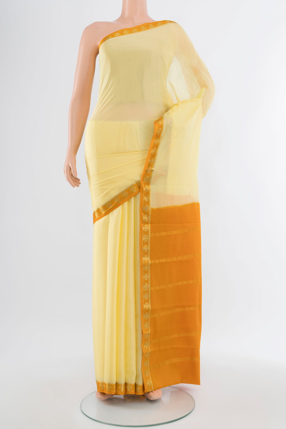Lemon Yellow Mysore Crepe Saree with Plain Body and Silk Border.  displayed on a mannequin