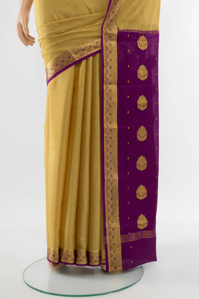 Pleats and pallu of Dark Beige Mysore Crepe Saree with Plain Body and Silk Border. 