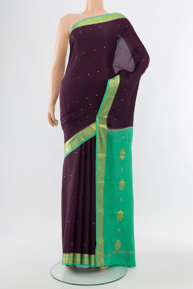 Violet Mysore Crepe Saree with Plain Body and Silk Border.  displayed on a mannequin