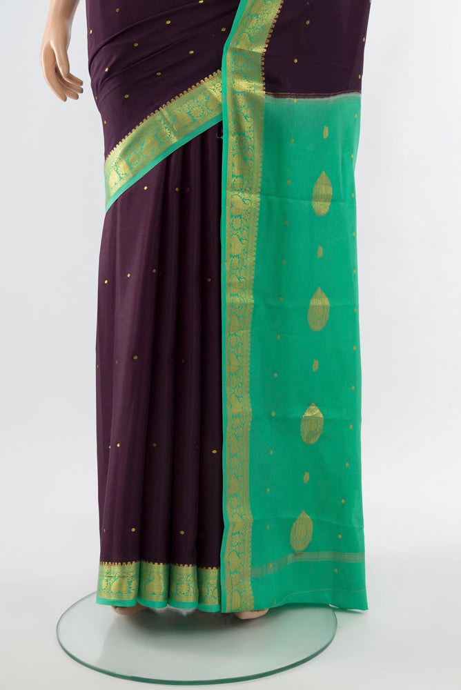 Pleats and pallu of Violet Mysore Crepe Saree with Plain Body and Silk Border. 