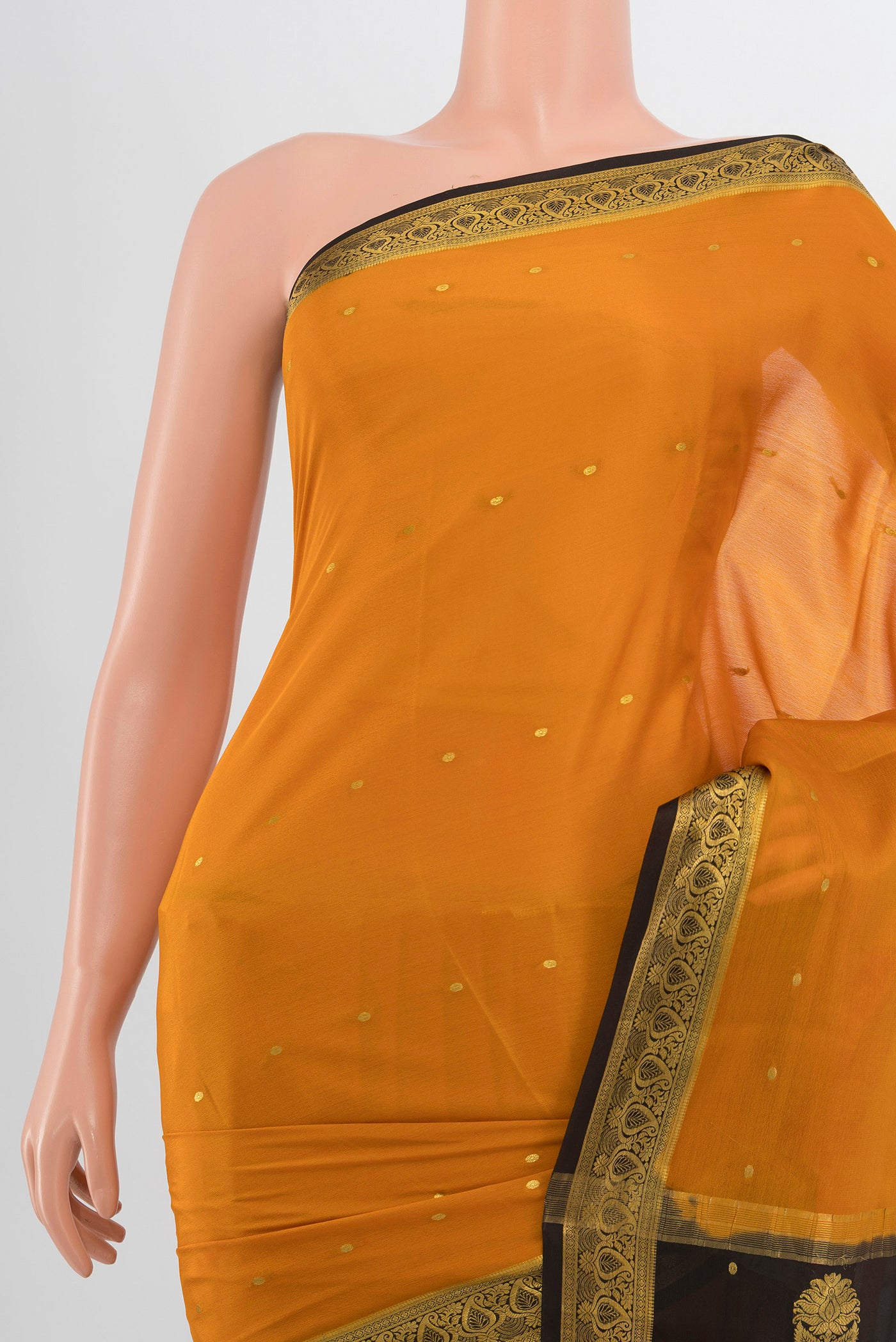 Border image of Mustard Mysore Crepe Saree with Zari Butta on the body and Silk Border. 