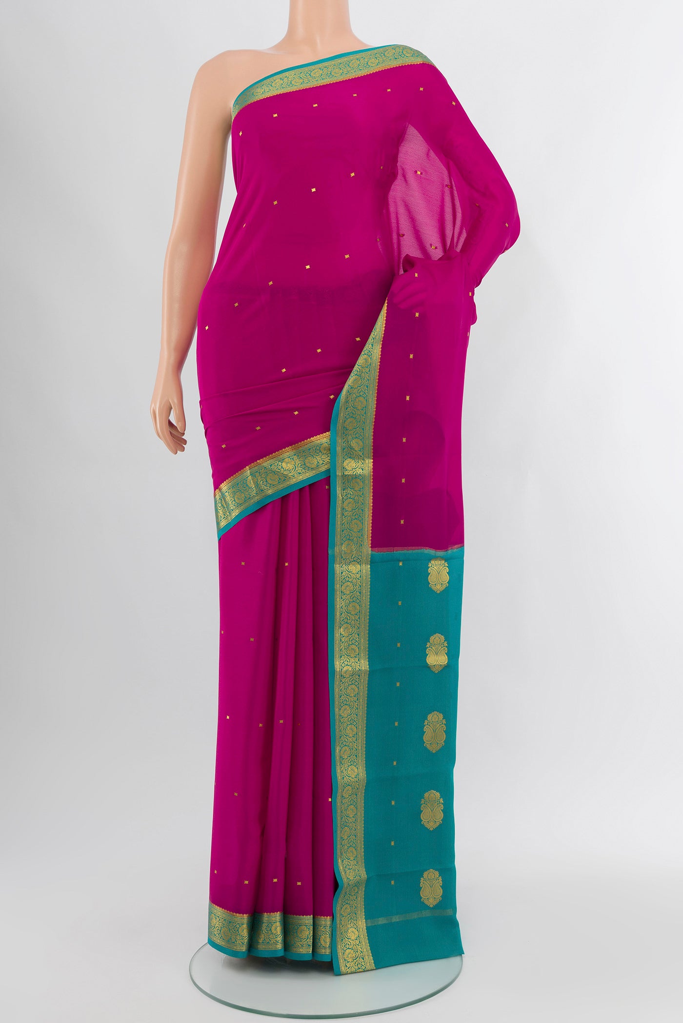 Purple Mysore Crepe Saree with Zari Butta on the body and Silk Border.  displayed on a mannequin
