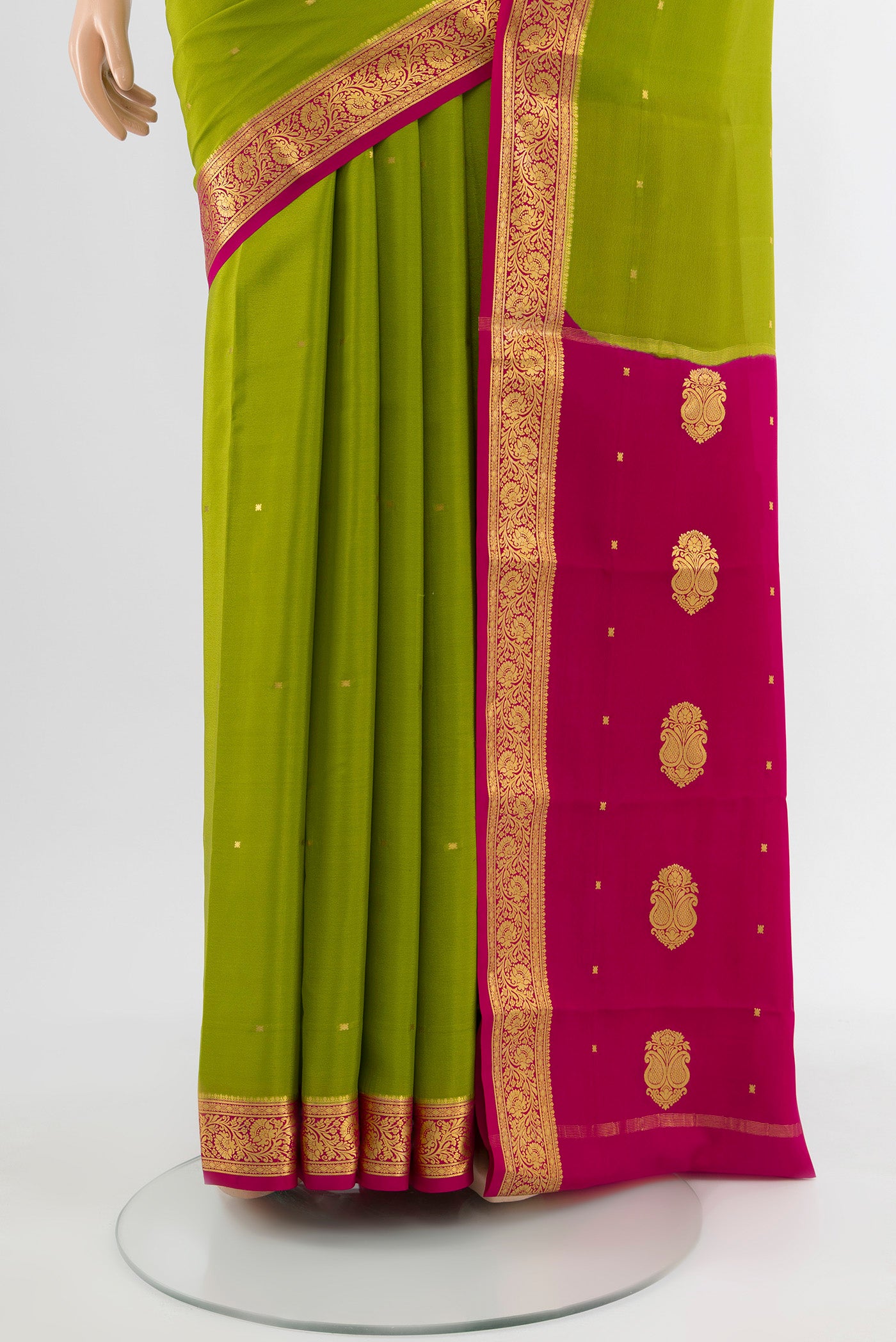Pleats and pallu of Light Green Mysore Crepe Saree with Plain Body and Silk Border. 