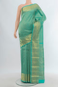 Pure Silk Pure Zari Turquoise Kanjivaram Saree with Zari Brocade on the body and Zari Border.  displayed on a mannequin