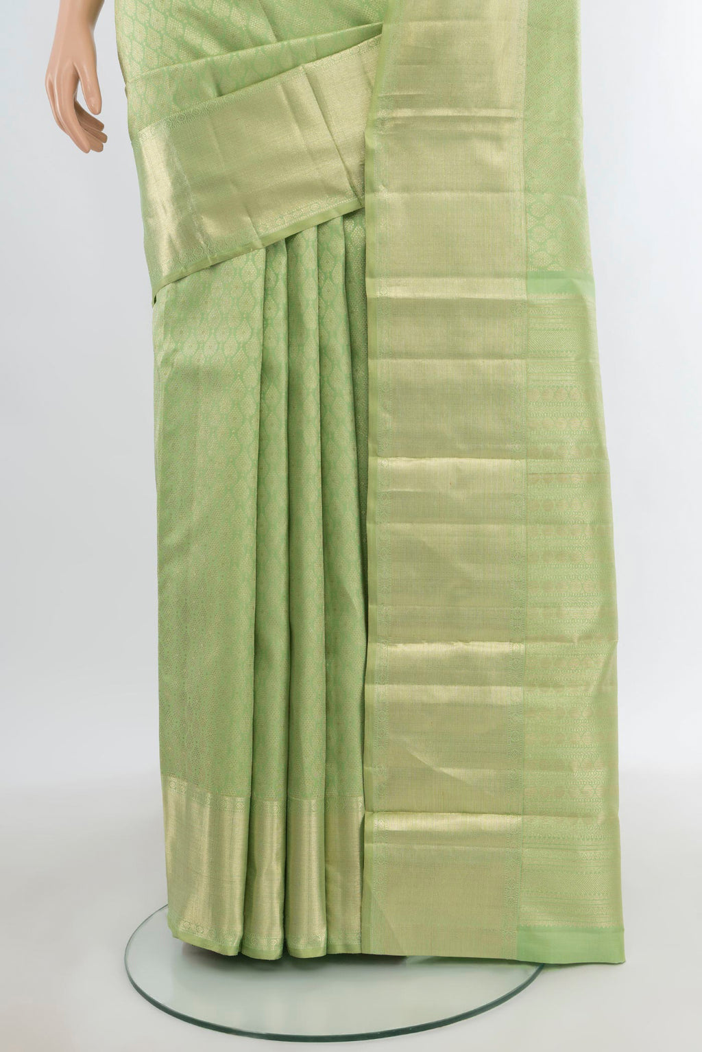 Pleats and pallu of Pista Green Kanjivaram Silk Saree with Zari Brocade on the body and Zari Border. 
