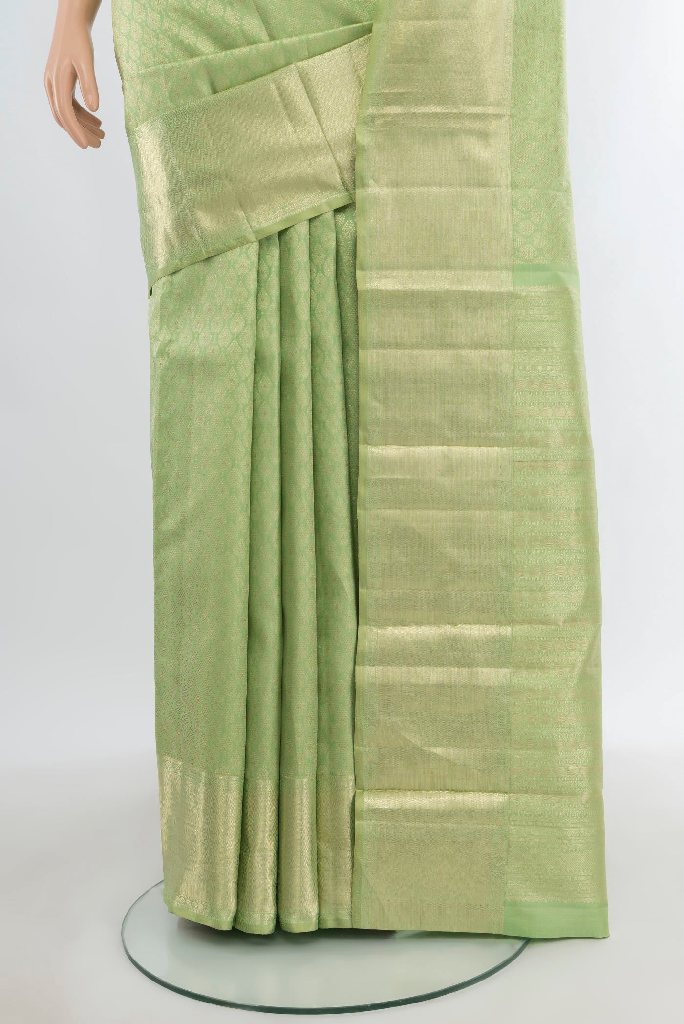 Pleats and pallu of Pista Green Kanjivaram Silk Saree with Zari Brocade on the body and Zari Border. 