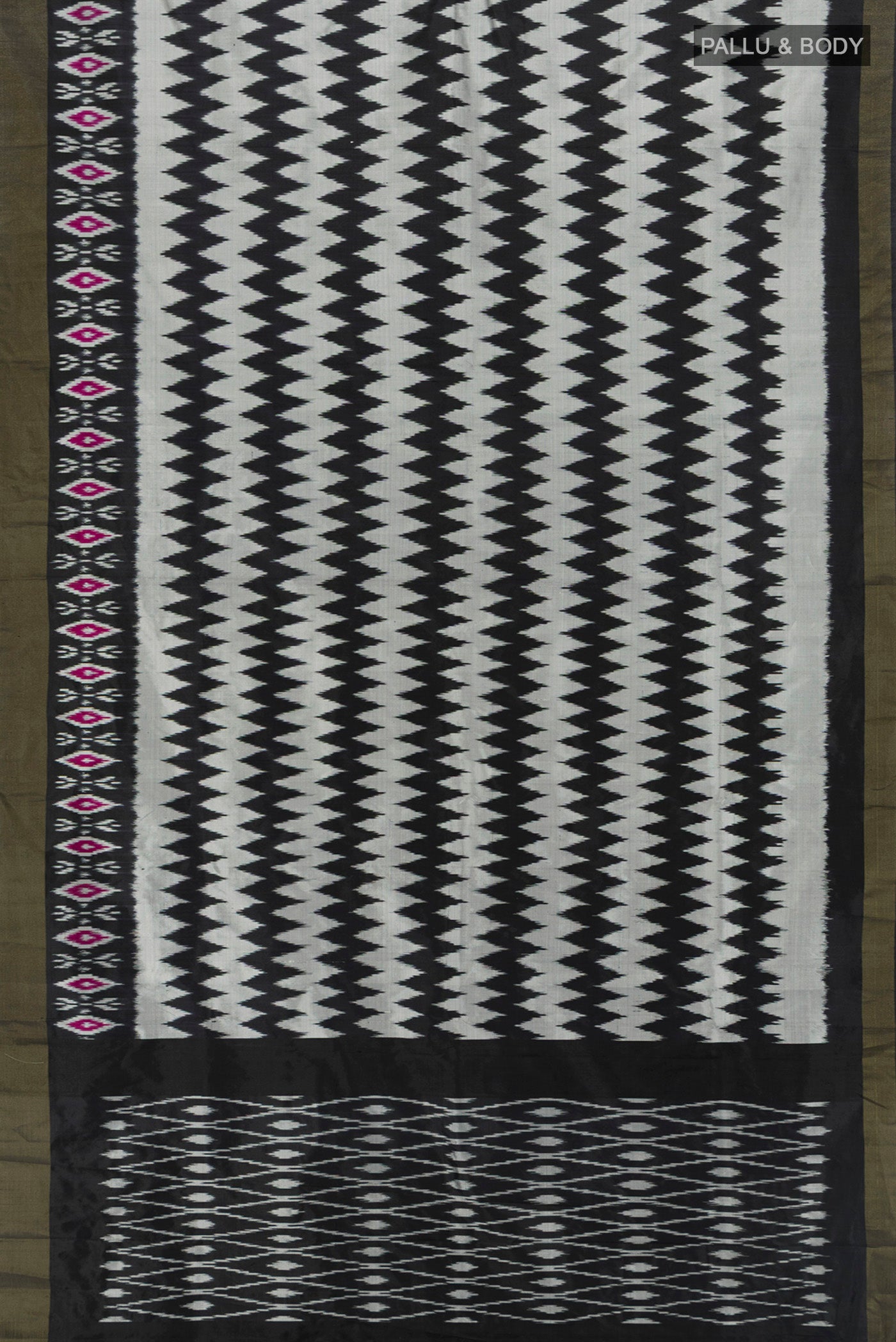 Flat view of Grey Pochampally Silk Saree with Pure Ikat on the body and Ikat Border. 