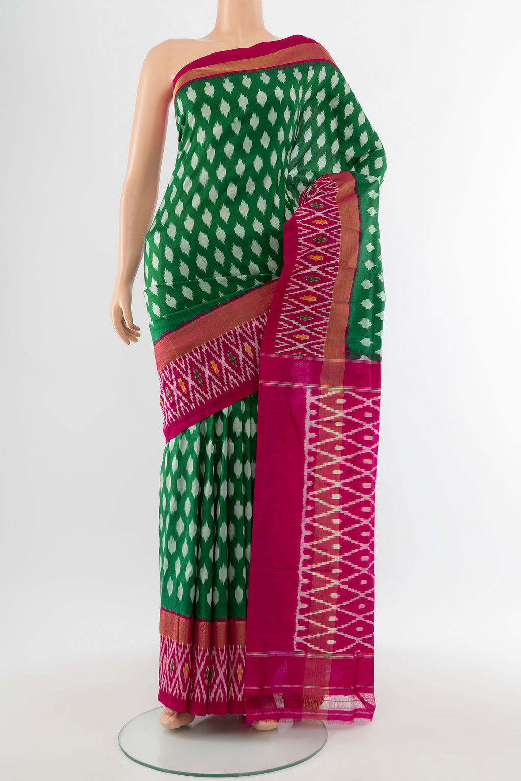 Pure Silk Pure Zari Mint Green Pochampally Saree with Ikat Print on the body and Silk Border.  displayed on a mannequin