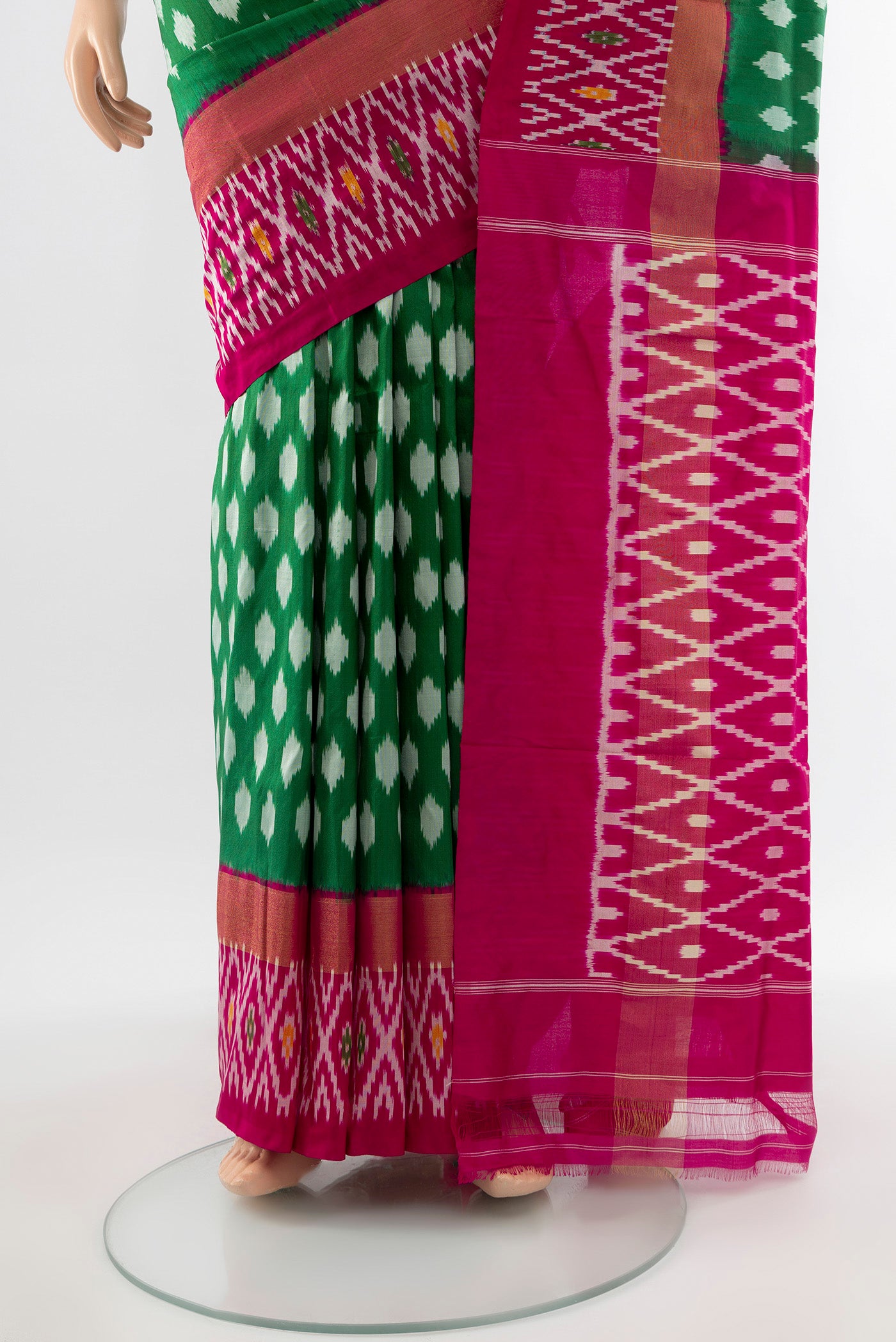 Pleats and pallu of Pure Silk Pure Zari Mint Green Pochampally Saree with Ikat Print on the body and Silk Border. 
