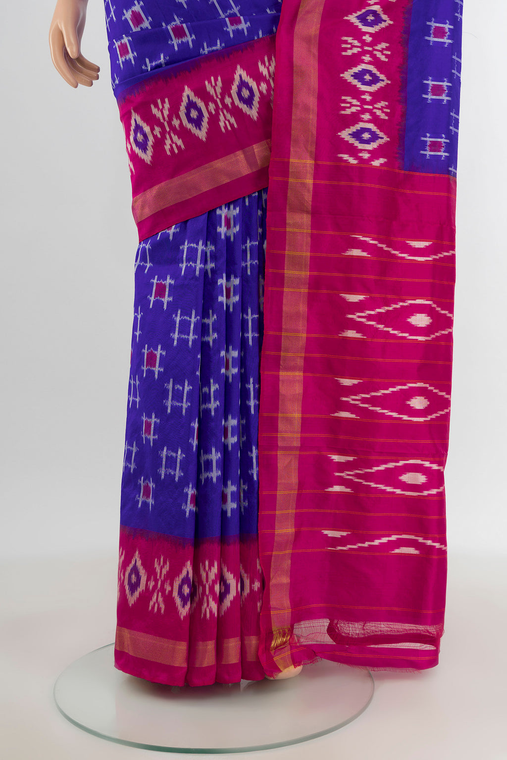 Pleats and pallu of Blue Pochampally Silk Saree with Ikat design on the body and Ikat Border. 