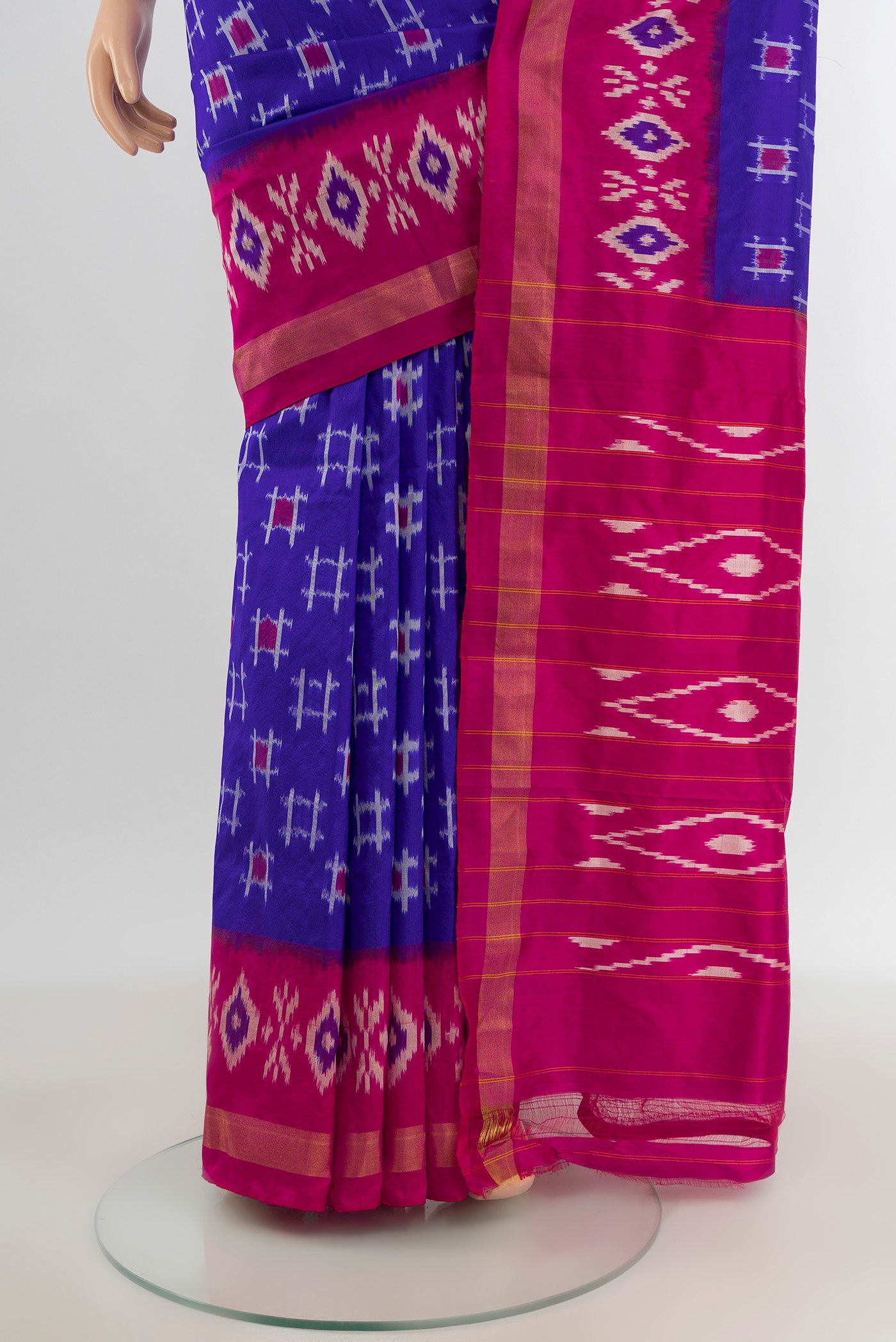 Pleats and pallu of Blue Pochampally Silk Saree with Ikat design on the body and Ikat Border. 
