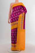 Purple Pochampally Silk Saree with Ikat design on the body and Ikat Border.  displayed on a mannequin