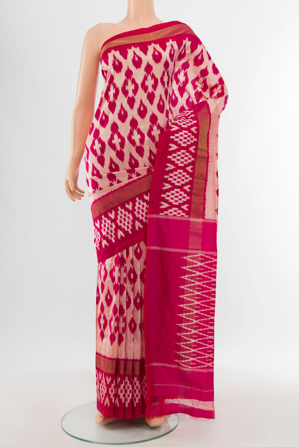 Multi Color Pochampally Saree with Ikat Print on the body and Silk Border.  displayed on a mannequin
