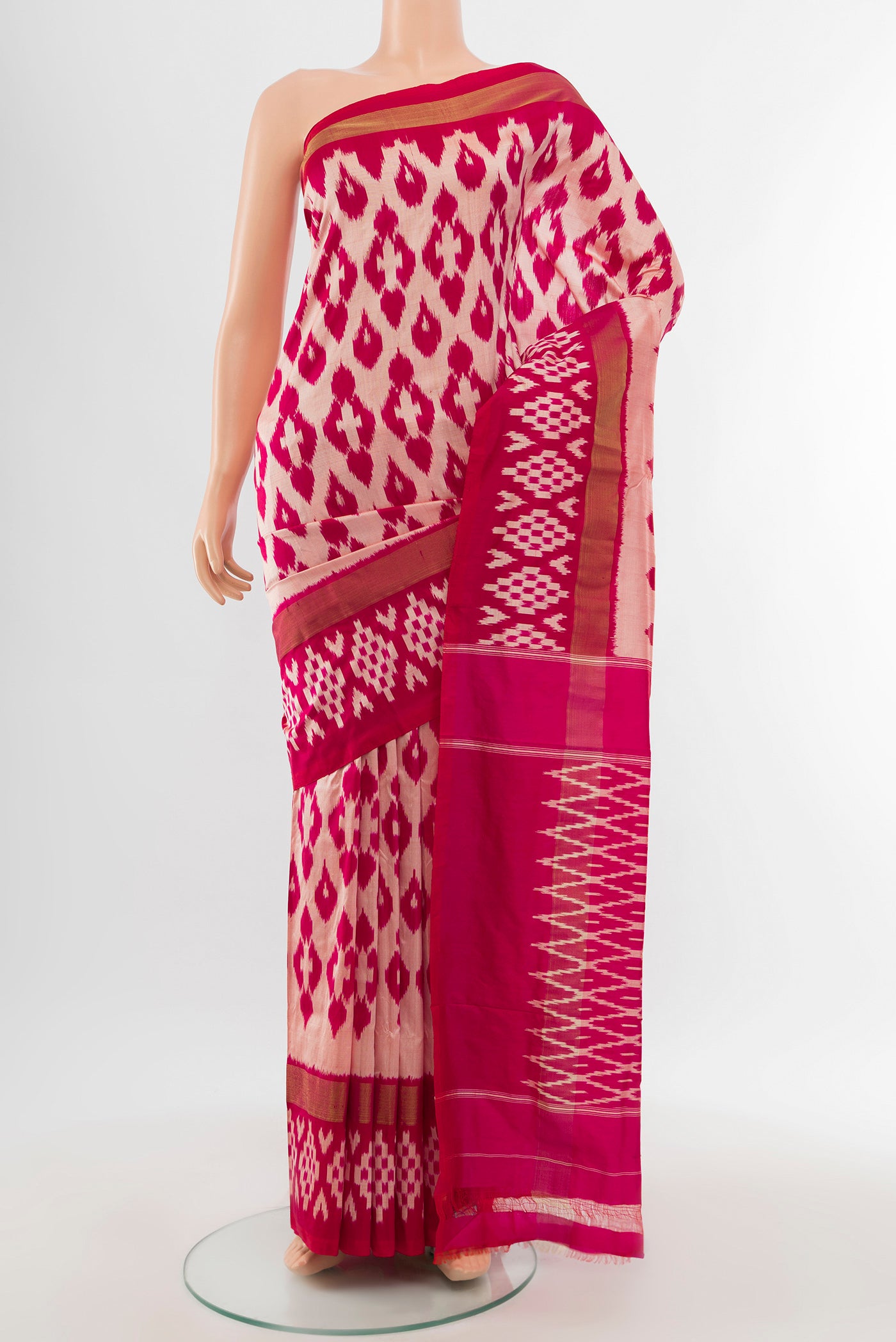 Multi Color Pochampally Saree with Ikat Print on the body and Silk Border.  displayed on a mannequin