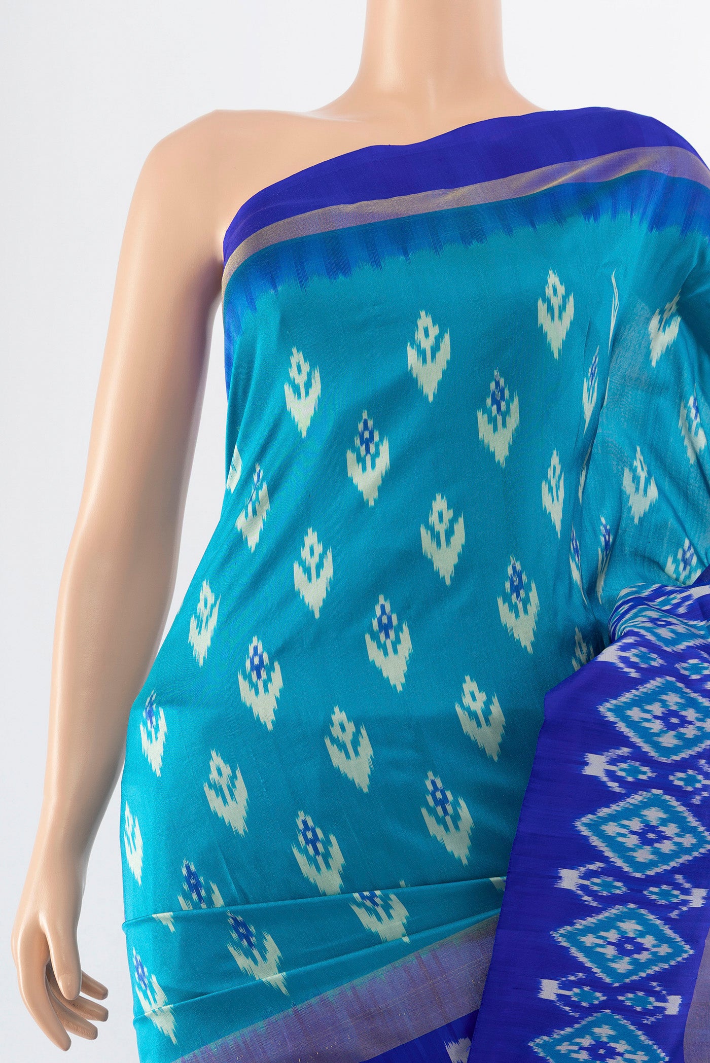 Border image of Pure Silk Pure Zari Light Blue Pochampally Saree with Ikat Print on the body and Silk Border. 