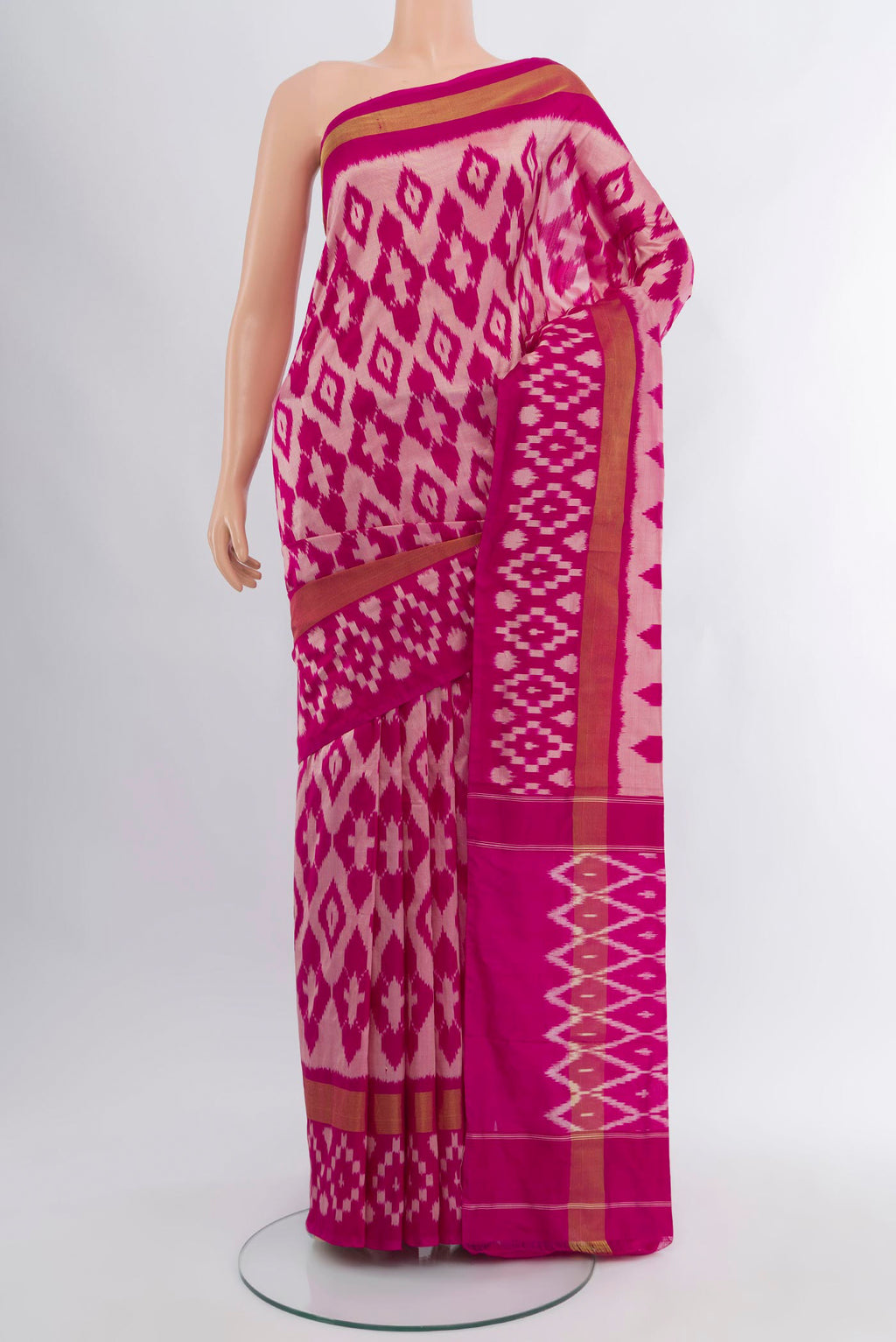 Pink Pochampally Silk Saree with Pure Ikat on the body and Ikat Border.  displayed on a mannequin