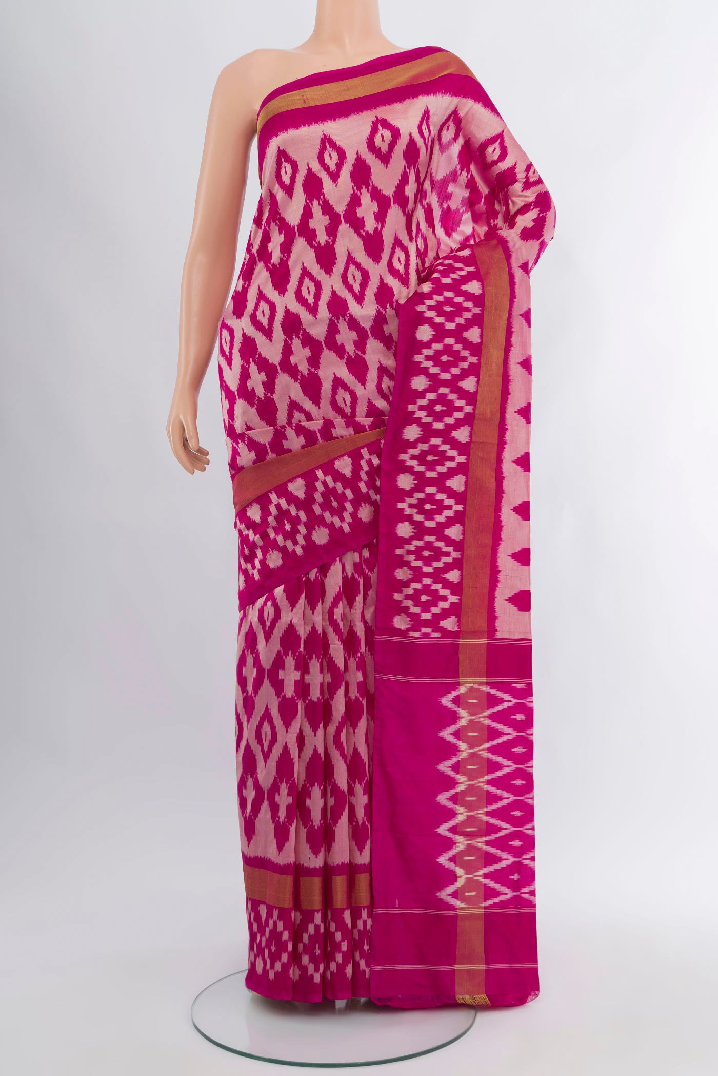 Pink Pochampally Silk Saree with Pure Ikat on the body and Ikat Border.  displayed on a mannequin