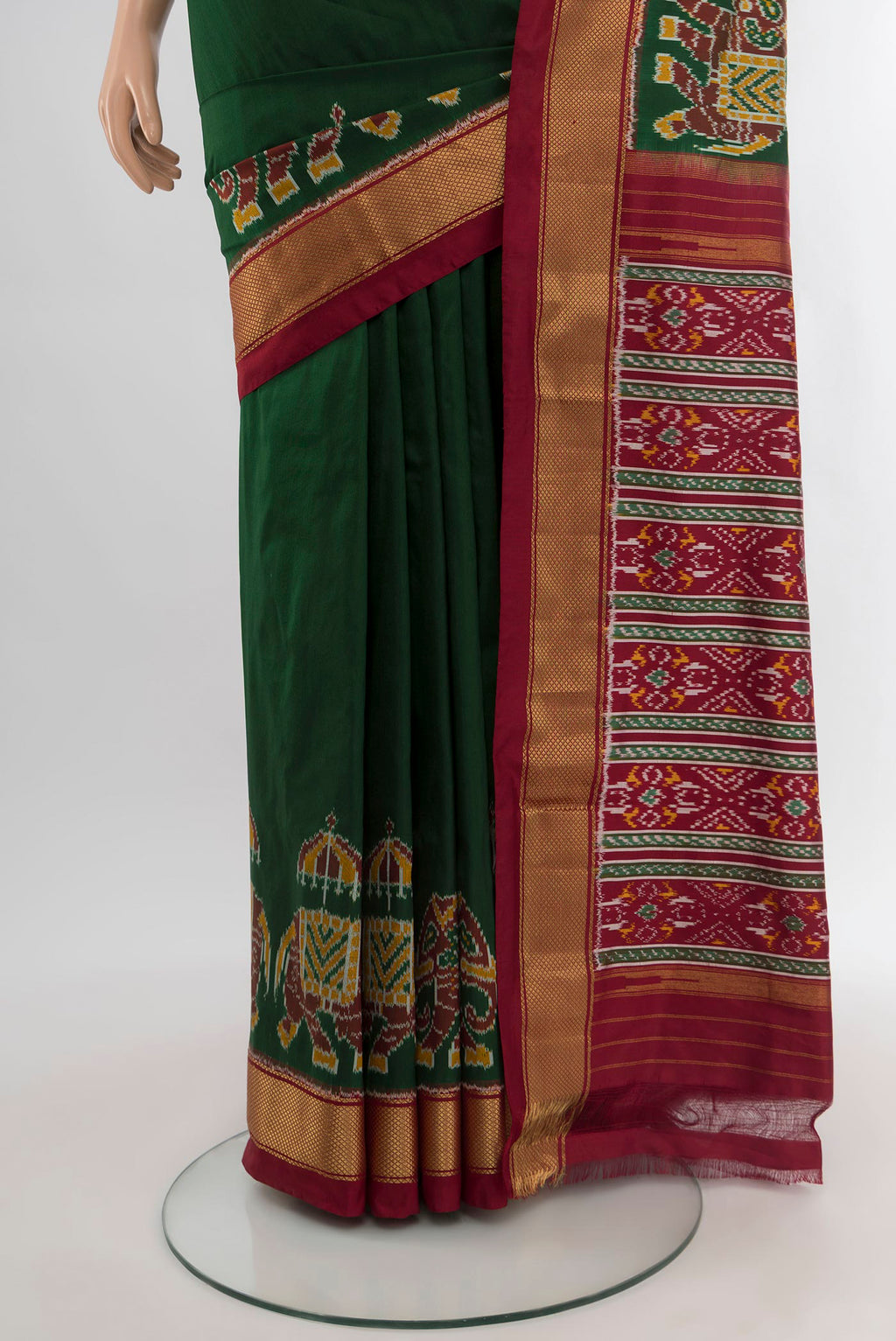 Pleats and pallu of Bottle Green Pochampally Silk Saree with Plain Body and Zari Border. 