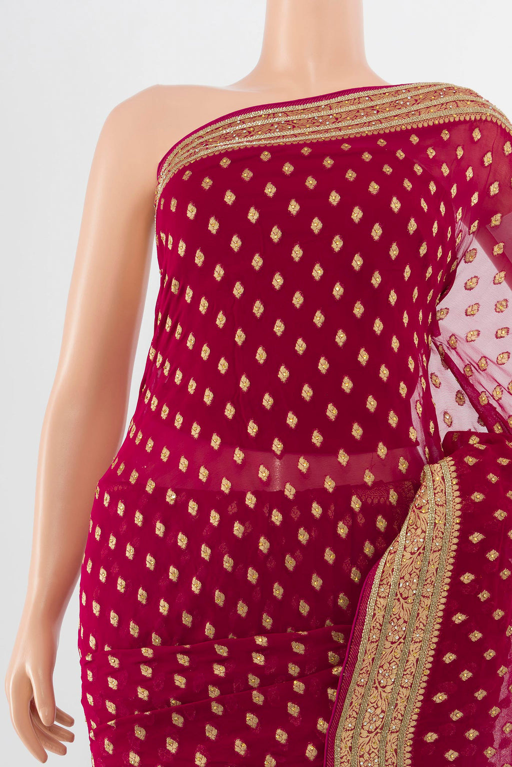 Border image of Maroon Embroidery Net Saree with Zari Butta on the body and Silk Border. 