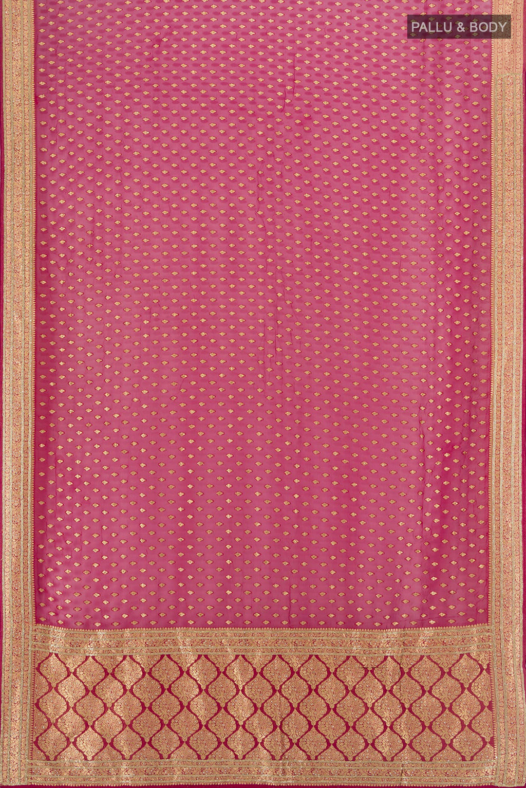 Flat view of Maroon Embroidery Net Saree with Zari Butta on the body and Silk Border. 