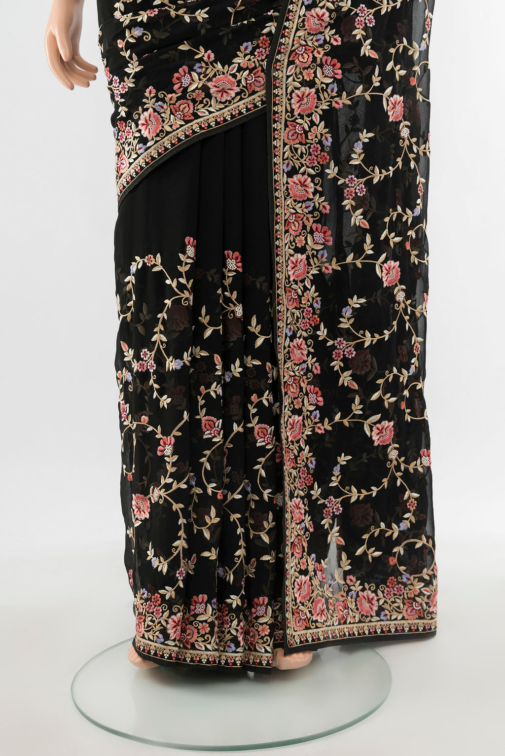 Pleats and pallu of Black Embroidery Net Saree with Embroidery on the body and Embroidery Border. 