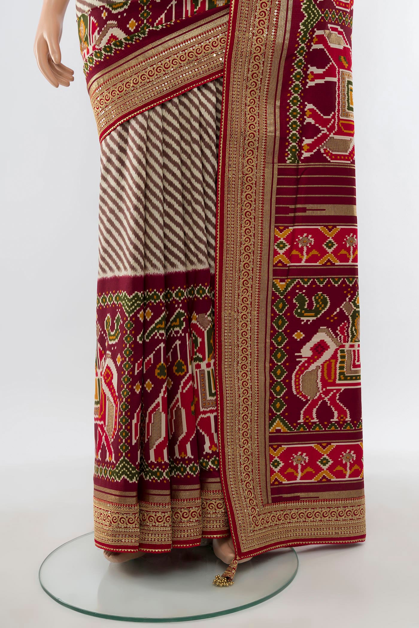 Pleats and pallu of Multi Color Art Silk Saree with Embroidery on the body and Embroidery Border. 