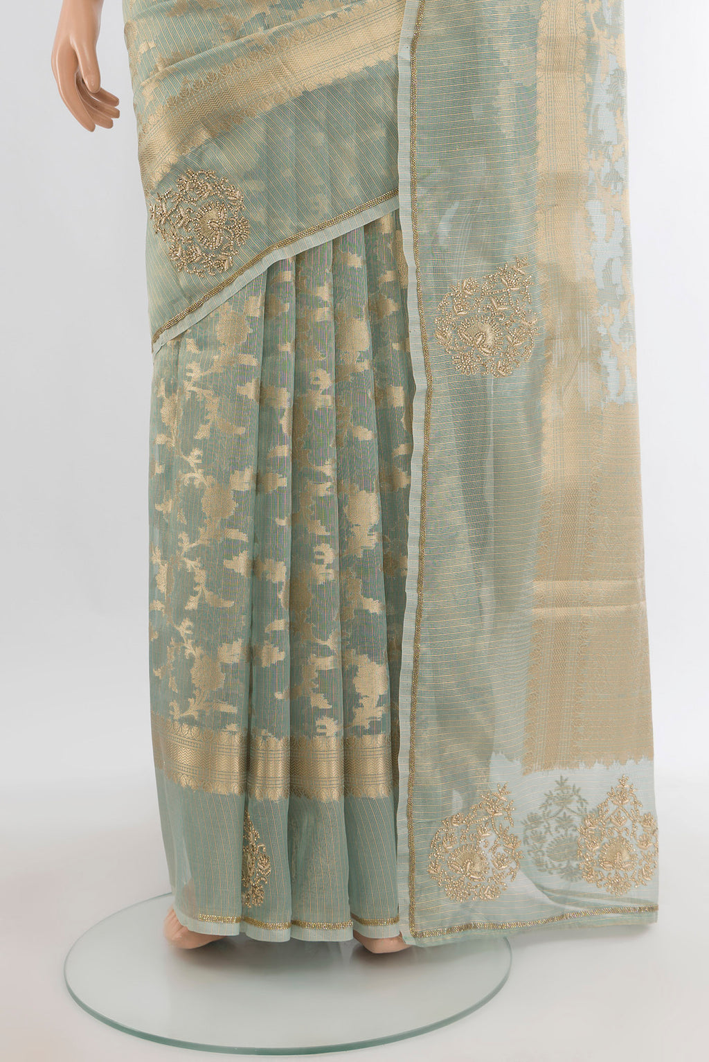 Pleats and pallu of Light Green Embroidery Net Saree with Embroidery on the body and Fancy Border. 